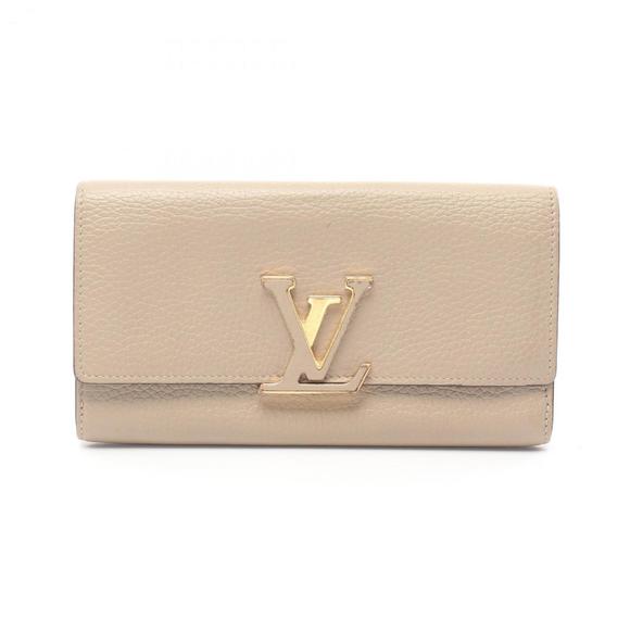 LOUIS VUITTON Beige Leather Wallet - Picture 1 of 11